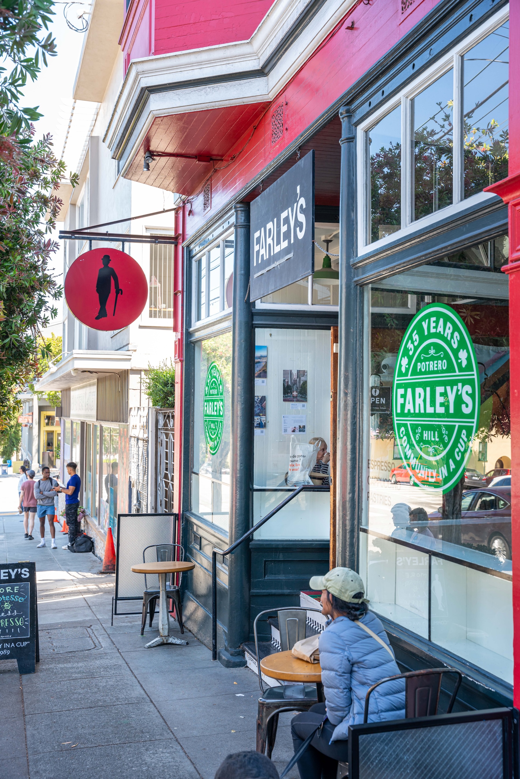 Farley's exterior with photos by Kevin Hou (Farley's Artist of the Month, August 2024)