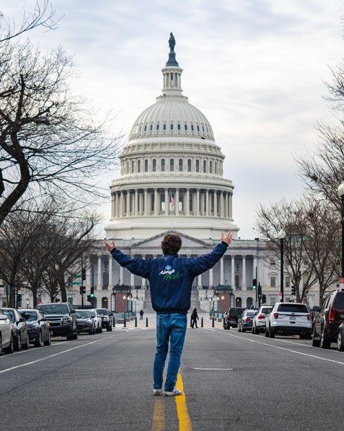 Desmond Standing in Front of Capitol Building